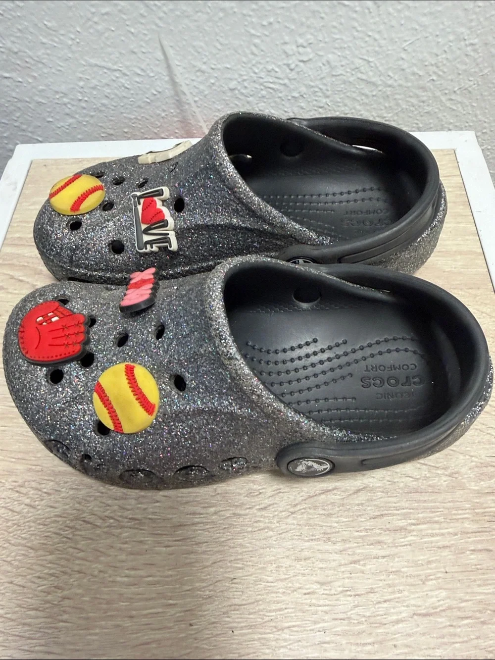 CROCS Kids' Silver Glitter Clog with Red & Yellow Sports Charms
